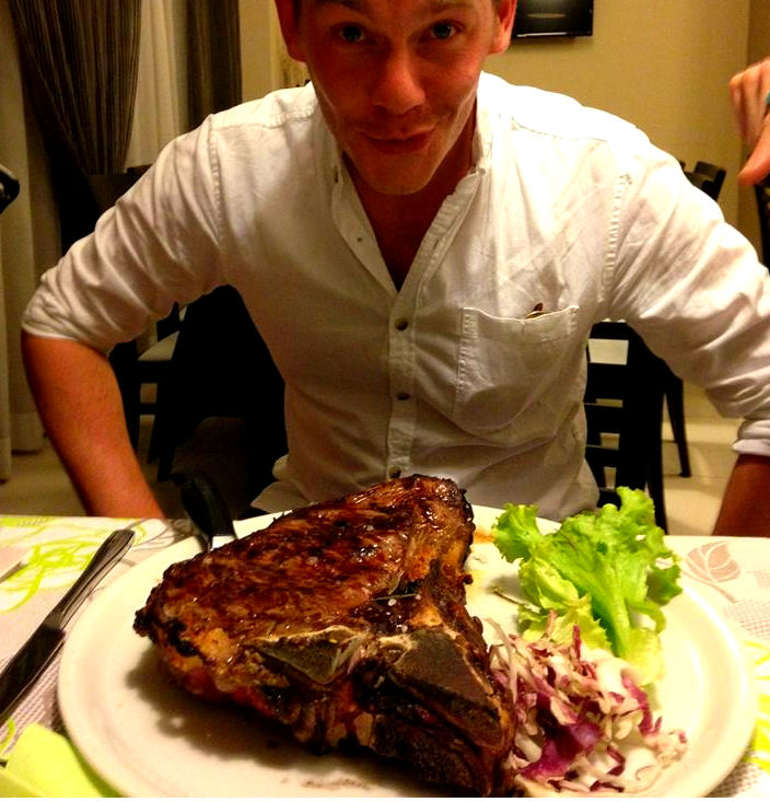 Man and meat. Bistecca Fiorentina